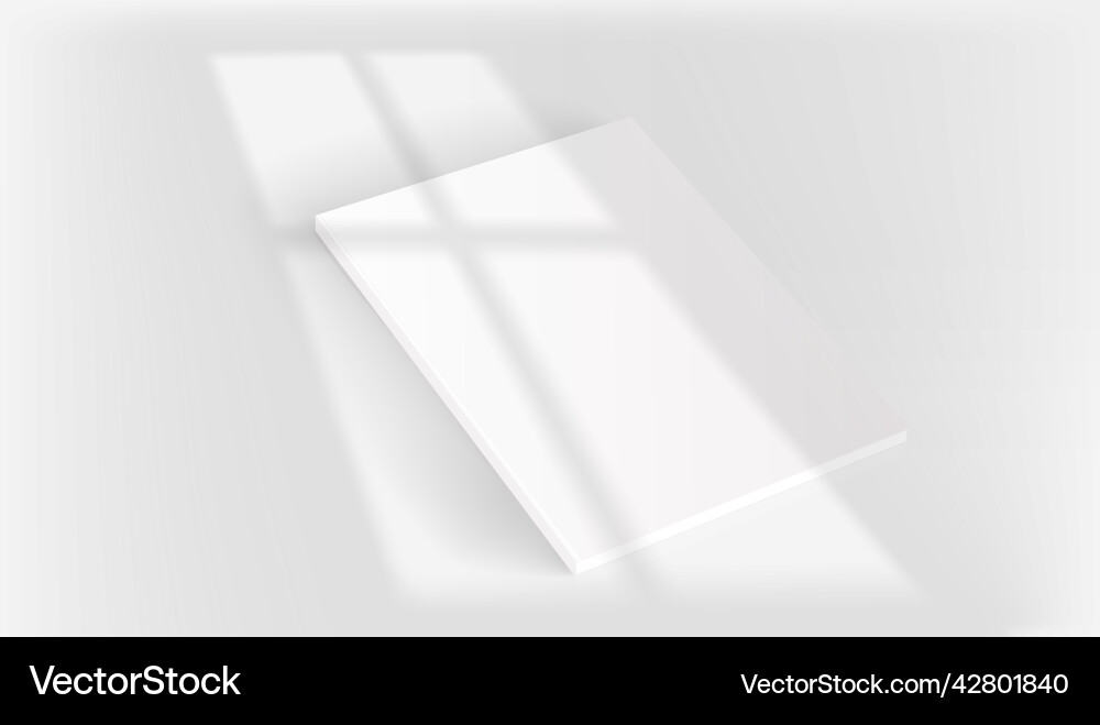 White book on a table with light of the window vector image