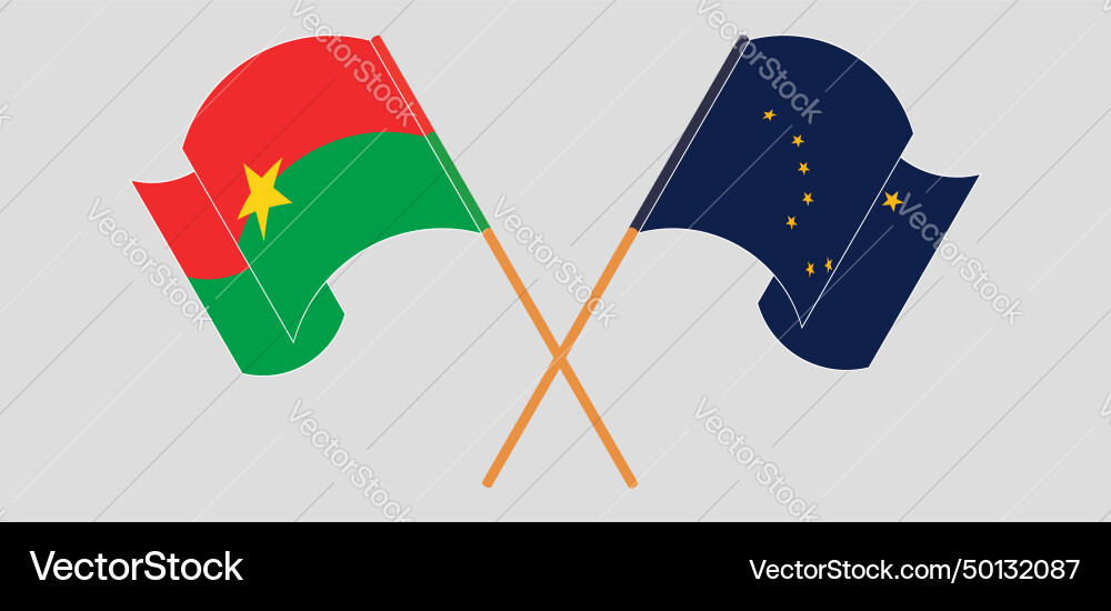 Gekreuzte und gewellte Flaggen von burkina faso Gekreuzte und gewellte Flaggen von burkina faso vektorbild