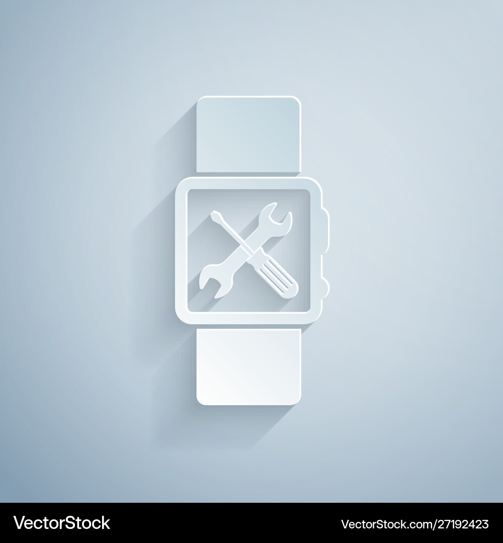 Paper cut smartwatch with screwdriver and wrench Paper cut smartwatch with screwdriver and wrench vector image