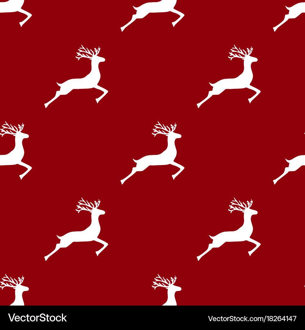 Seamless pattern reindeer on a red background vector image
