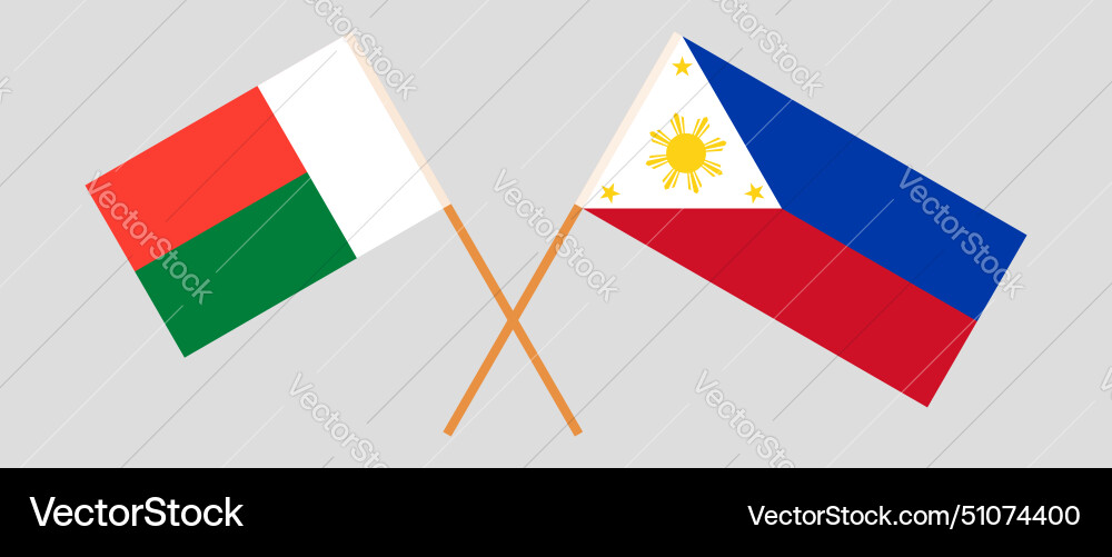 Überquerte Flaggen von Madagaskar und den Philippinen Überquerte Flaggen von Madagaskar und den Philippinen vektorbild