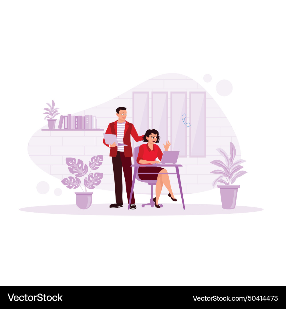 Happy coworkers using laptop computers while Vector Image
