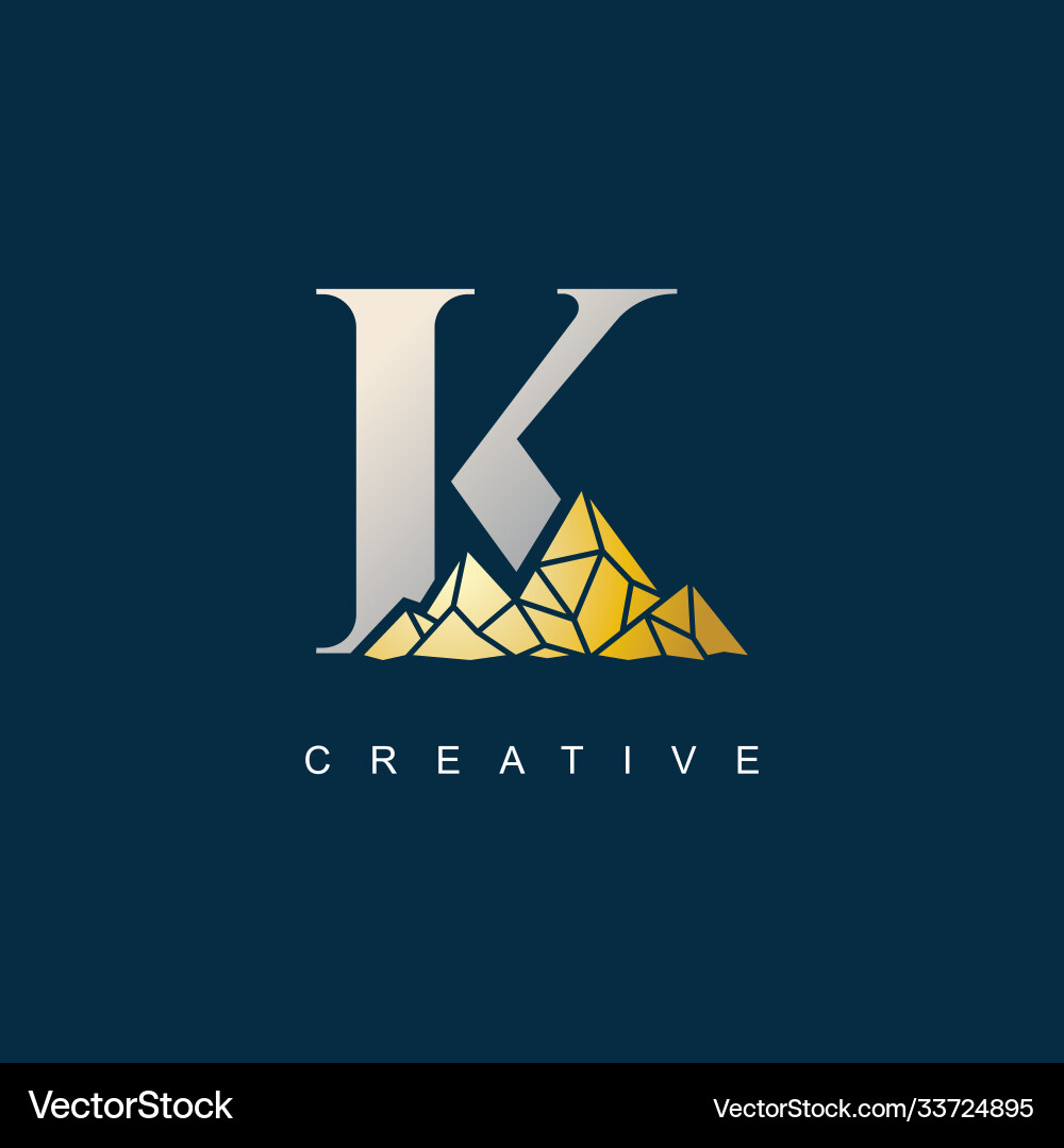 Buchstaben k mit goldenem Berg-Logo Buchstaben k mit goldenem Berg-Logo vektorbild