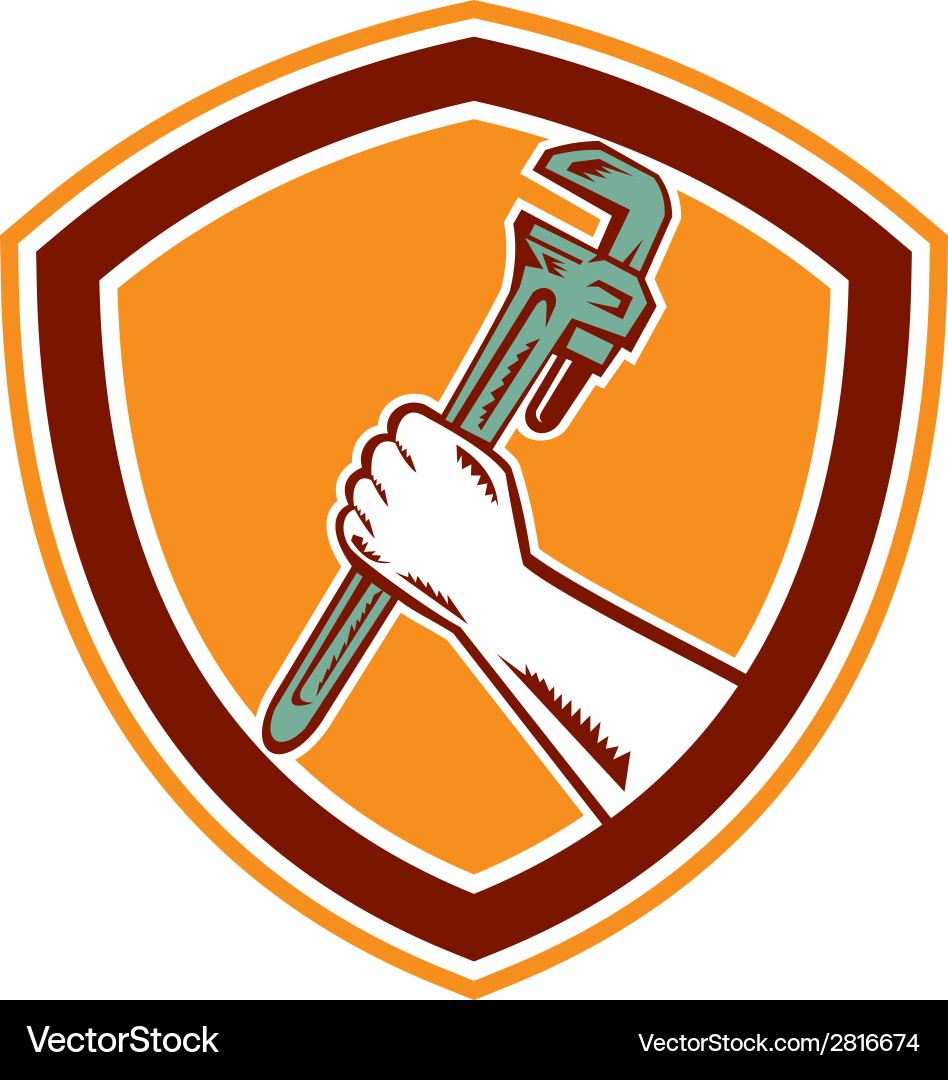 Hand holding adjustable wrench shield woodcut Vector Image