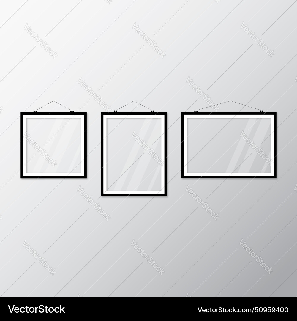 Three black white picture frames hanging Vector Image