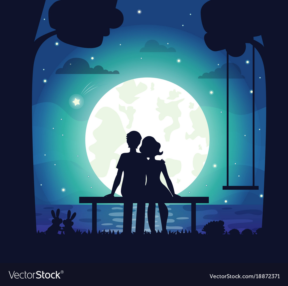 Romantic couple sitting on seaside under moonlight