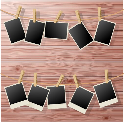 Retro photo frames hanging on rope isolated Vector Image