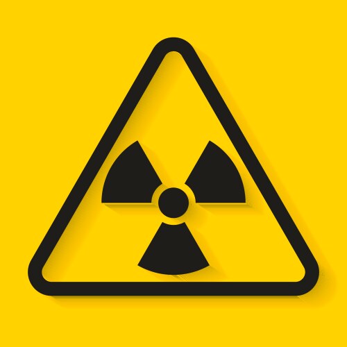 Danger radioactive sign on yellow background vector image