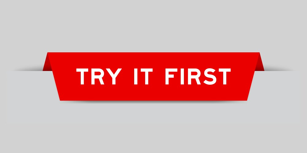 Red color inserted label with word try it first vector image
