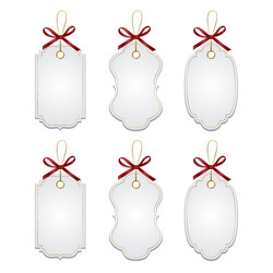 set of elegant tags with red bows vector