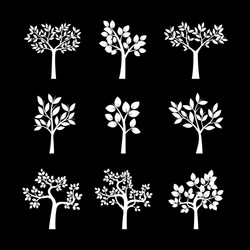 set of white trees and leafs vector