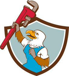 Eagle plumber raising up pipe wrench crest cartoon vector