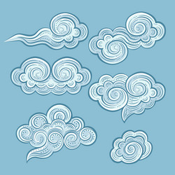 Hand-drawn decorative blue clouds set vector