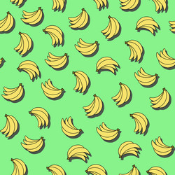 Seamless pattern with bananas on green background vector