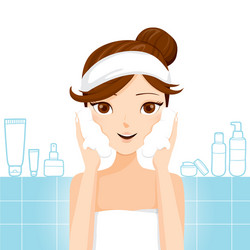 Young woman washing face with foam vector