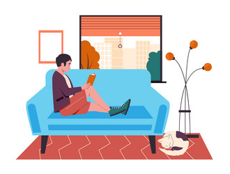 man reading book on couch at home vector image