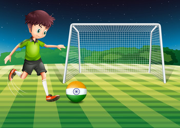 an athlete kicking the ball with flag of india vector