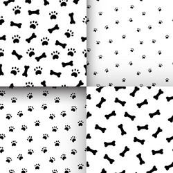 seamless pattern with paws and bones vector image
