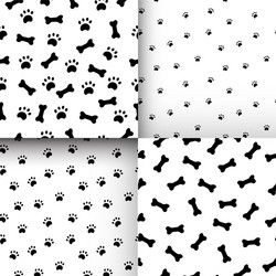 Seamless pattern with paws and bones vector