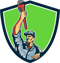 plumber raising up monkey wrench shield retro Vector Image