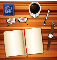 notebook on table with other accessories vector image