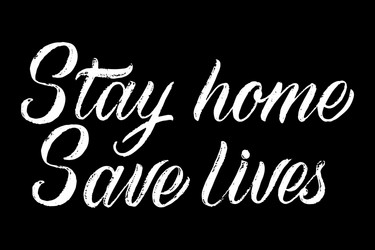 Stay at home save lives lettering hand vector