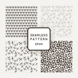 set of four seamless patterns with flowers vector image