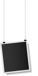 realistic empty photo frame hanging on strings vector image
