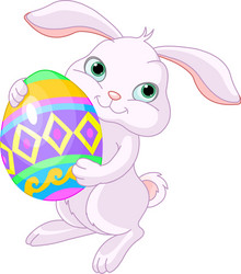 Cute easter bunny carrying egg Royalty Free Vector Image
