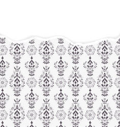 Damask pattern with torn paper vector