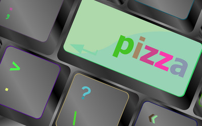 Computer keyboard with blue pizza word on enter vector