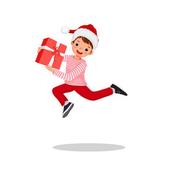 happy little boy jumping holding christmas gift vector