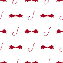 Seamless pattern with red devil wings and tail vector