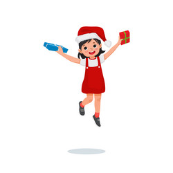 happy little girl jumping holding christmas gift vector