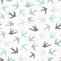 seamless pattern with a flock of swallows vector image