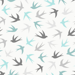 seamless pattern with a flock of swallows vector