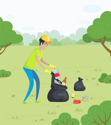 Man collecting garbage in park environment care vector