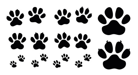 paw icon set black print of dog and cat Vector Image