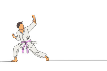 One single line drawing of young sporty karateka vector