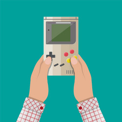 Old gadget handheld game console in hands vector