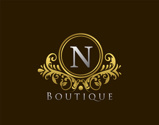 luxury boutique letter n logo vintage golden Vector Image