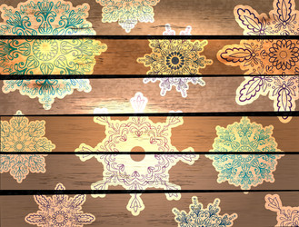 wood background with beautiful snowflakes vector