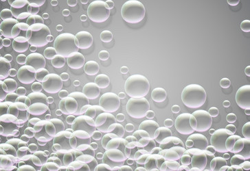 Soap bubbles abstract blue background with rainbow