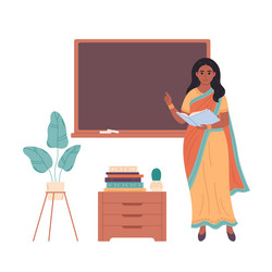 Indian female teacher at classroom near blackboard vector