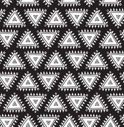 Tribal seamless pattern with triangles geometric vector