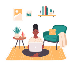 Black woman sitting with laptop in living room vector