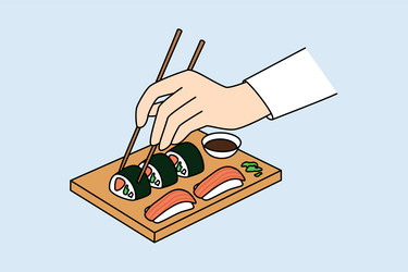 Person hold chopsticks eating sushi vector