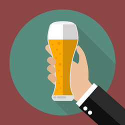 glass of beer in hand vector