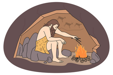 caveman making fire in cave