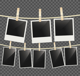 Retro photo frames hanging on rope isolated Vector Image